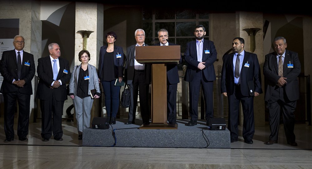 Delegation members of the main Syrian opposition body the High Negotiations Committee, delegation head Asaad al Zoabi, delegate George Sabra and HNC chief negotiator and Army of Islam rebel group's leading member Mohammed Alloush (3rd R