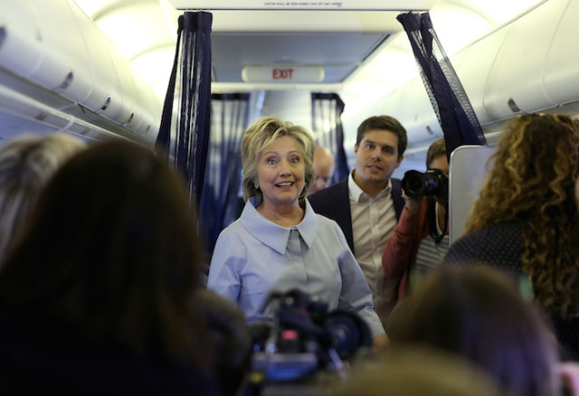 WHITE PLAINS NY- SEPTEMBER 05 Democratic presidential nominee former Secretary of State Hillary Clinton chats with reporters aboard her new campaign plane at Westchester County Airport