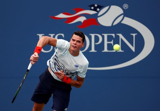 Milos Raonic of Canada serves to Ryan Harrison of the United States during the second round of the U.S. Open tennis tournament Wednesday Aug. 31 2016 in New York