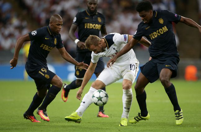 Harry Kane centre is crowded out by Monaco defenders at Wembley