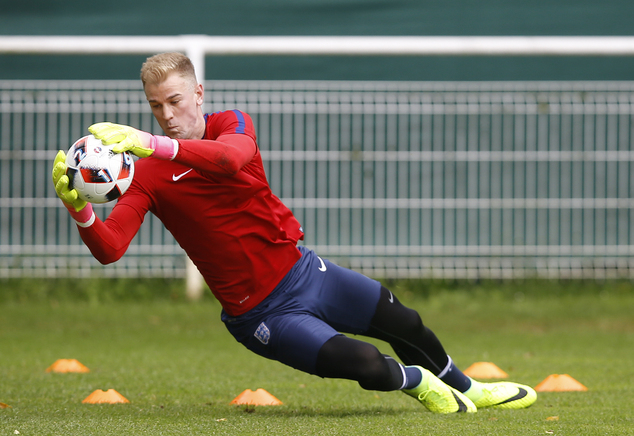 Joe Hart as he makes a save during a training session in Chantilly France. England