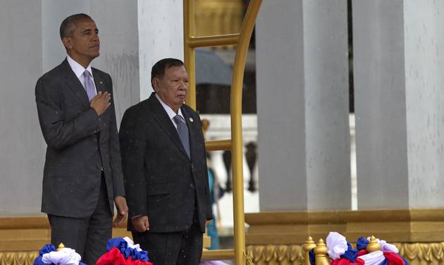 Barack Obama stand as the national anthems are played at Presidential Palace in Vientiane Laos Tuesday Sep 6 2016. President Obama met with Laotian President Vorachit on the first visit