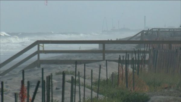 Hermine lingers off shore continuing its unsafe storm