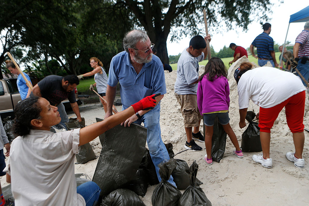 BRADENTON FL- SEPTEMBER 1 Residents fill sandbags at a local park as winds and storm surge associated with Tropical Storm Hermine impact the area