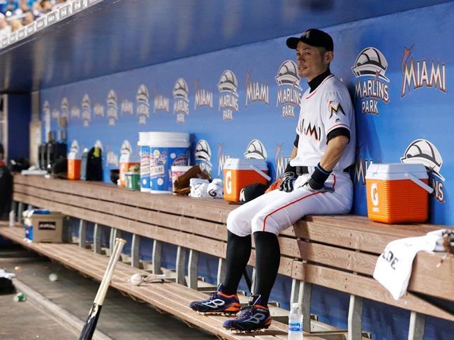 Miami Marlins&#39 Ichiro Suzuki of Japan sits in the dugout during the first inning of a baseball game against the Los Angeles Dodgers Friday Sept. 9 2016 in Miami