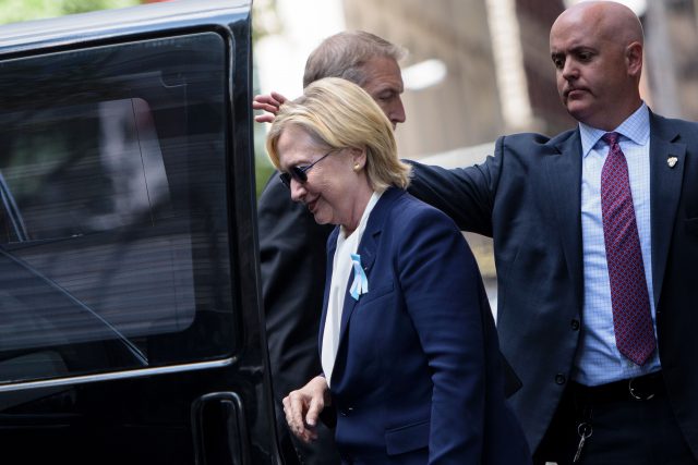 US Democratic presidential nominee Hillary Clinton gets in her car while leaving her daughter's apartment building after resting