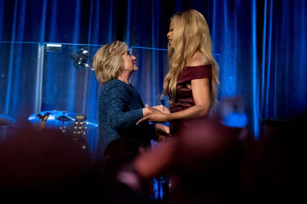 Democratic presidential candidate Hillary Clinton left is welcomed to the stage by Laverne Cox right at a LBGT For Hillary Gala at the Cipriani Club in New York Friday Sept. 9 2016