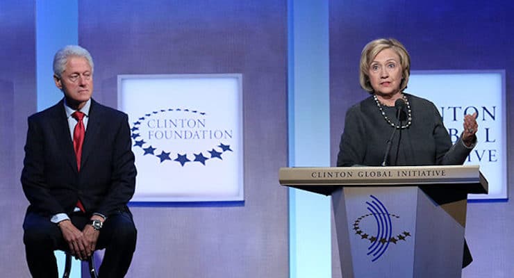 Hillary Clinton and Bill Clinton speak at an event for the Clinton Foundation or Clinton Global Initiative