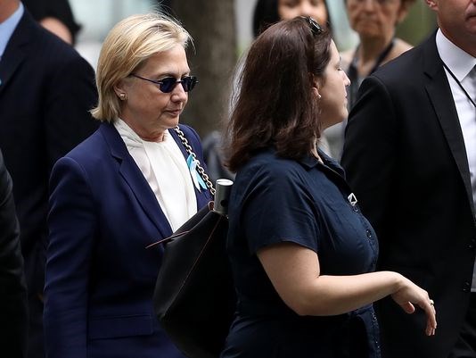 Hillary Clinton arrives at a 9/11 anniversary ceremony in New York on Sunday