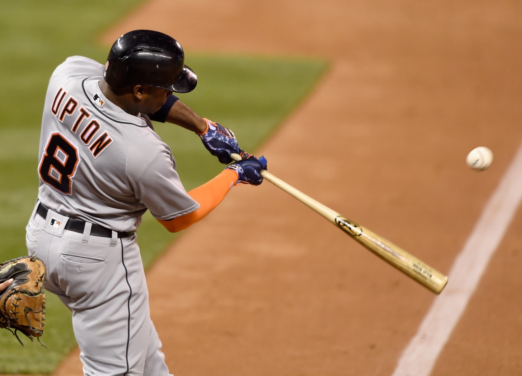 MINNEAPOLIS MN- SEPTEMBER 20 Justin Upton #8 of the Detroit Tigers hits an RBI single against the Minnesota Twins during the sixth inning of the game