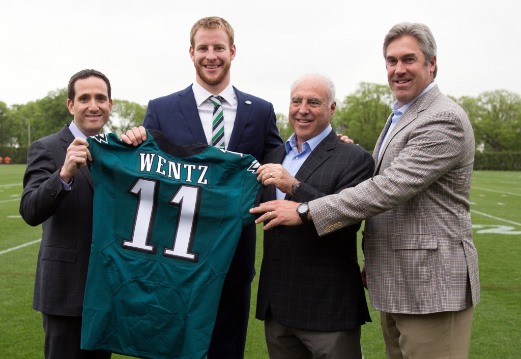 Apr 29 2016 Philadelphia PA USA From right to left Philadelphia Eagles head coach Doug Pederson and owner Jeffrey Lurie and quarterback Carson Wentz and vice president of football operations Howie Roseman pose for