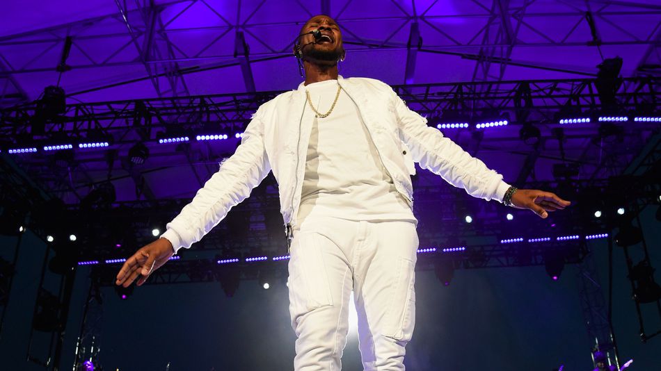 Usher performs at hi iHeartRadio Album Release Party on AT&T Live at Pier 15