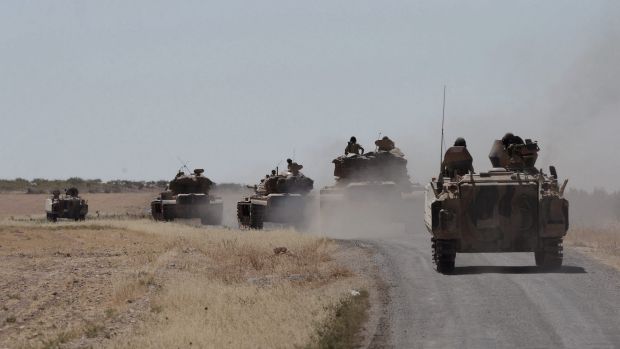 Turkish troops and allied Syrian rebels expelled the Islamic State group from the last strip of territory it controlled