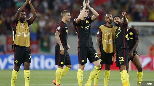 Manchester City's John Stones applauds fans after the game