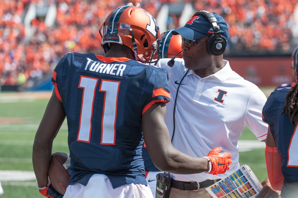 Illinois coach Lovie Smith greets Illinois wide receiver Malik Turner after Turner's touchdown reception during the first quarter of an NCAA college football game against Murray State on Saturday Sept. 3 2016 at Memorial Stadium in Champaign