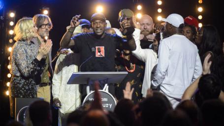 Image Text
 BIG WIN Friends and family join Skepta on stage