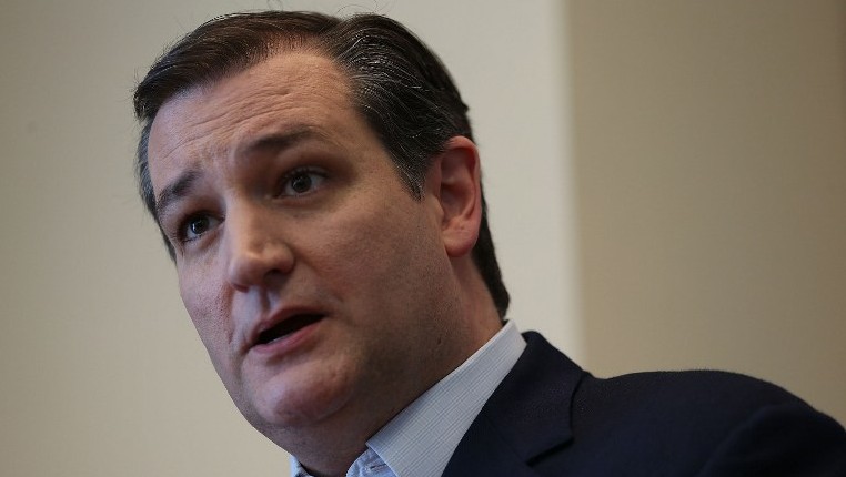 Republican Presidential candidate Sen. Ted Cruz speaks with reporters during a visit to the Republican National Committee Spring Meeting at the Diplomat Resort