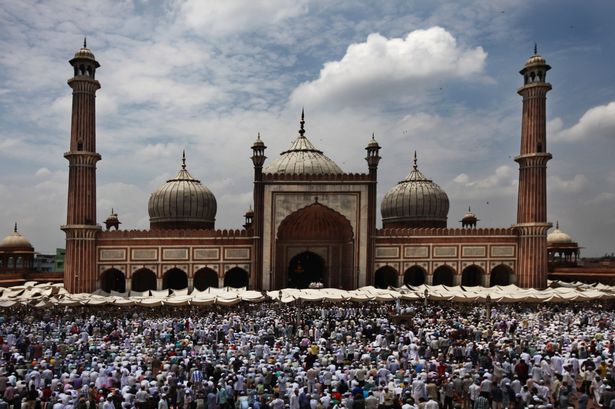 Indian Muslims offer prayers on Juma-tul-wida or the last Friday of Ramadan at Jama Masjid or the Grand Mosque in New Delhi