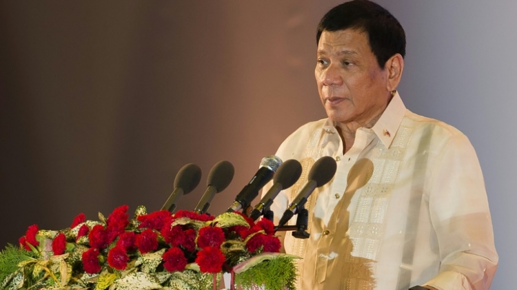 Philippine President Rodrigo Duterte speaks during the closing ceremony of the Association of Southeast Asian Nations summit in Vientiane