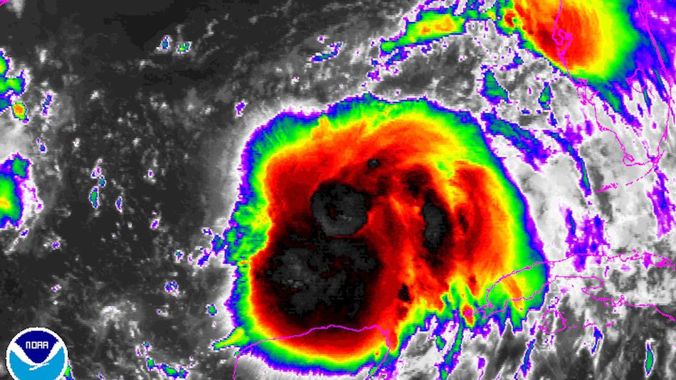 Infrared satellite image showing massive flareup of thunderstorms around the brewing tropical storm