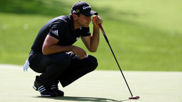 Injured Jason Day pulled out of the BMW Championship with a back probkem