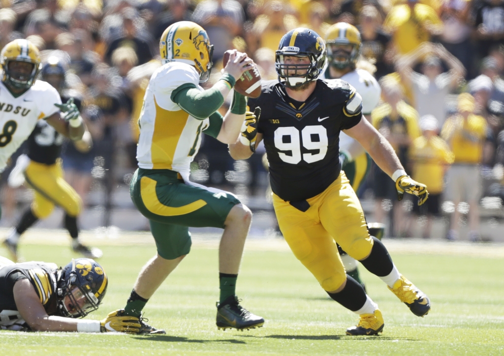 Iowa defensive lineman Nathan Bazata chases North Dakota State quarterback Easton Stick during the first half of an NCAA college football game Saturday Sept. 17 2016 in Iowa City Iowa