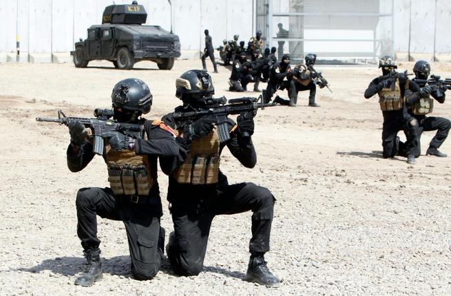 Iraq's'Golden Division counter-extremism forces train in Baghdad as they preparare for an operation to retake Mosul