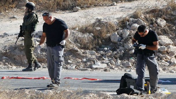 Israeli police at the scene of an attempted stabbing according to the army near the West Bank town of Bani Naim