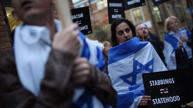 Israeli protesters gather outside the Palestinian Mission in London on Tuesday to protest at the recent stabbings