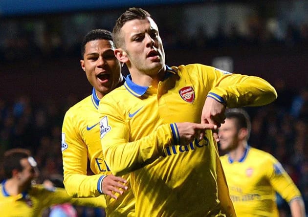 Jack Wilshere of Arsenal celebrates a goal against Aston Villa with Serge Gnabry