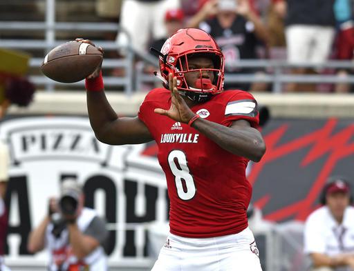 Louisville quarterback Lamar Jackson looks for a receiver during the first quarter of an NCAA college football game against Florida State Saturday Sep. 17 2016 in Louisville Ky