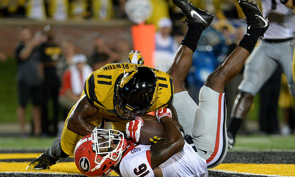 COLUMBIA MO- SEPTEMBER 17 Isaiah Mc Kenzie #16 of the Georgia Bulldogs pulls in a pass for a touchdown against Aarion Maxey Penton #11 of the Missouri Tigers in the fourth quarter at Memorial Stadium