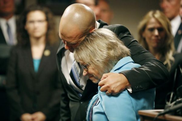 Patty Wetterling is consoled by son Trevor during