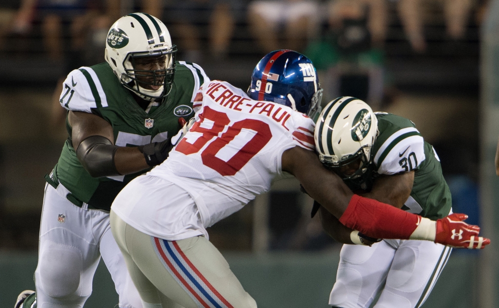 Aug 27 2016 East Rutherford NJ USA New York Giants defensive end Jason Pierre Paul tackles New York Jets running back Lache Seastrunk in the 2nd half at Met Life Stadium. New York Giants defeat the New York Jets 21-20. Mandatory Credit Will