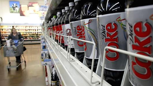 Wal-Mart customer peruses the soda aisle