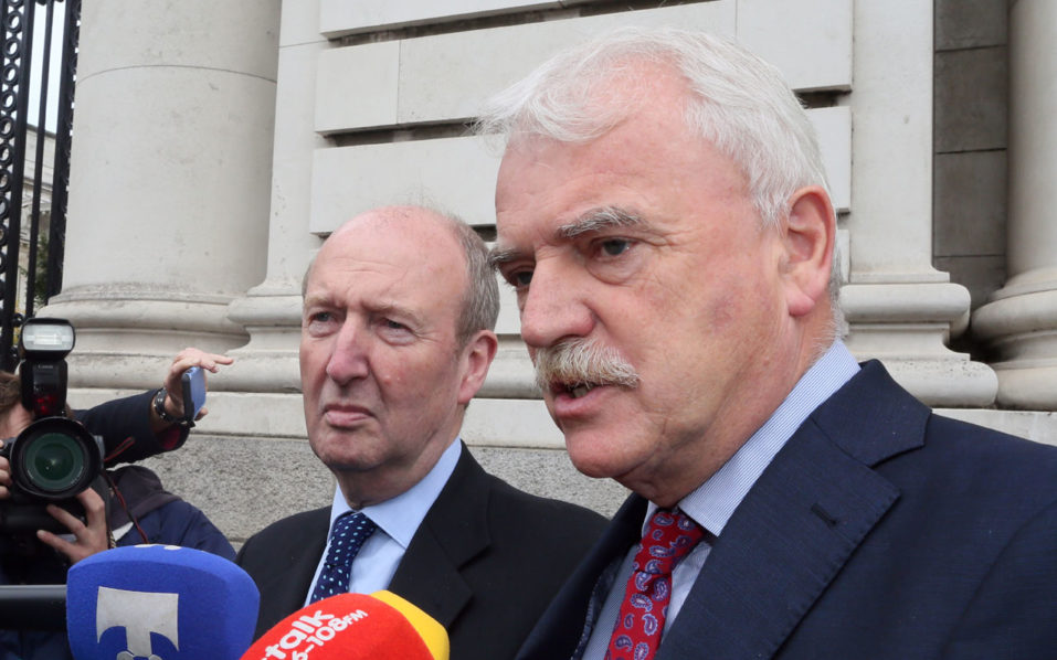 Independent Alliance Ministers Shane Ross and Finian Mc Grath speak to the press on arrival at Goverment buildings for a cabinet meeting in Dublin