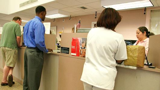 Retail bank customers and teller