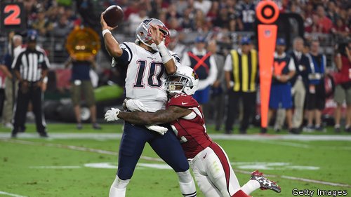 Jimmy Garoppolo comes under pressure against the Arizona Cardinals