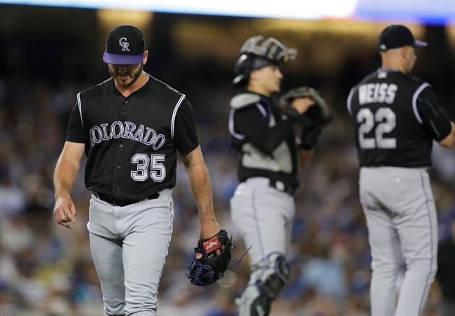 Colorado Rockies starting pitcher Chad Bettis left leaves the mound after he was pulled by manager Walt Weiss during the fifth inning of a baseball game against the Los Angeles Dodgers Saturday Sept. 24 2016 in Los Angeles