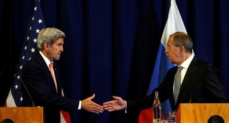 U.S. Secretary of State John Kerry and Russian Foreign Minister Sergei Lavrov shake hands at the conclusion of their news conference following their meeting in Geneva Switzerland where they discussed the crisis in Syria