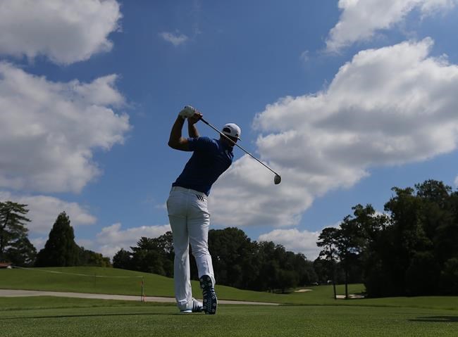 Dustin Johnson tees off on the sixth hole during a practice round for the Tour Championship golf tournament at East Lake Golf Club in Atlanta on Tuesday Sept. 20 2016