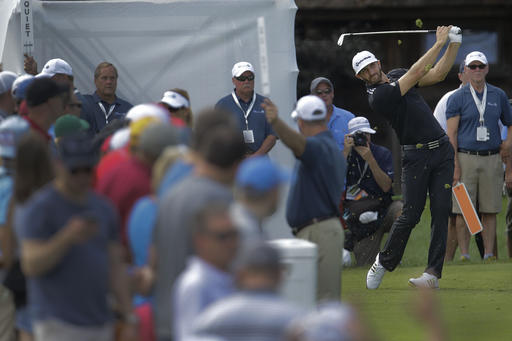 Dustin Johnson drives off the tee of the sixth hole during the third round of the BMW Championship golf tournament at Crooked Stick Golf Club in Carmel Ind. Saturday Sept. 10 2016