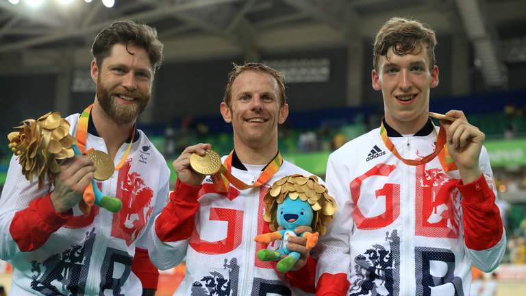 Jon-Allan Butterworth Jody Cundy and Louis Rolfe celebrate with their gold medals