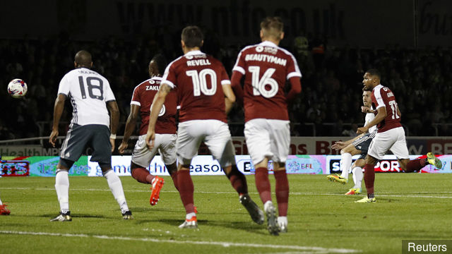 Manchester United's Michael Carrick scores their first goal