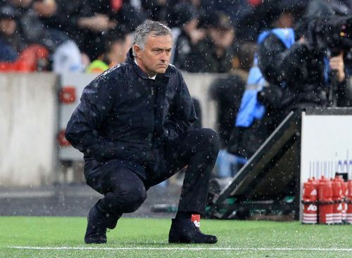 Jose Mourinho watching Manchester United intently on the sideline