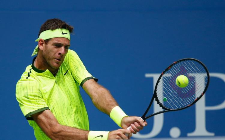 Juan Martin del Potro moves onto the quarterfinals after his opponent can no longer play through a knee injury