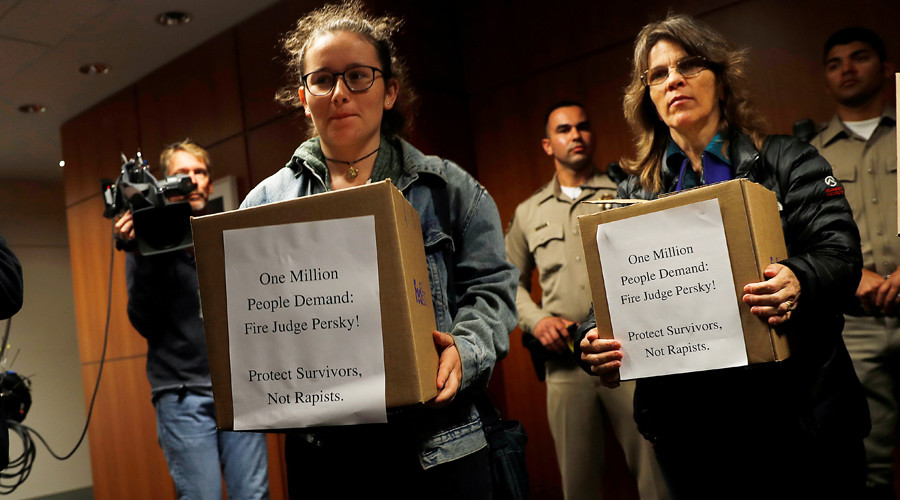 Activists deliver boxes of signed petitions to the California Commission on Judicial Performance calling for the removal of Judge Aaron Persky from the bench after his controversial sentencing in the Stanford rape case in San Francisco California U.S