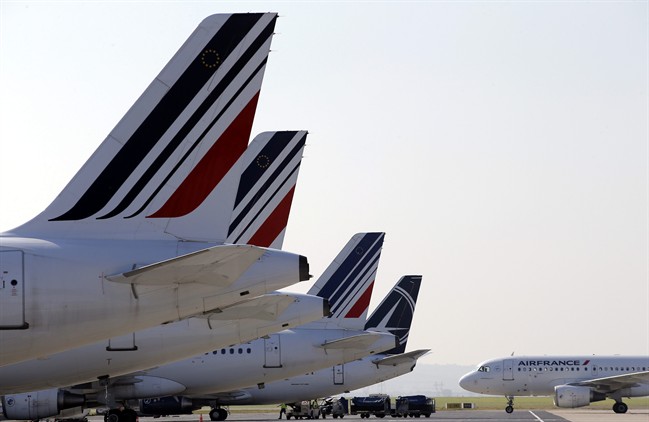 Air France planes are parked on the tarmac of the Paris Charles de Gaulle airport in Roissy near Paris