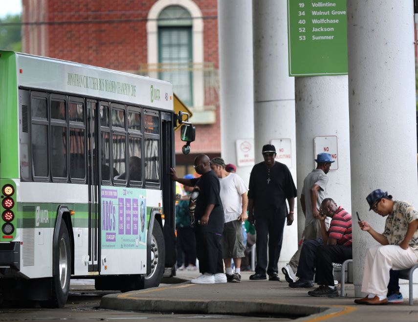 Riders board a MATA bus at the main terminal in downtown Memphis