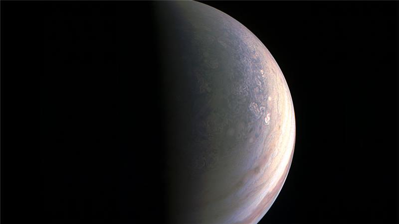 Juno made its first full flyby of the Jupiter poles sending images video and audio back to Earth